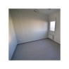 Unidad de stock 6×3 metros con ventanas lado largo izquierdo RAL 7016