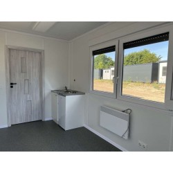 Contenedor habitable de 6,00 x 2,44 con cocina americana, WC y ducha.