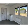 Contenedor habitable de 6,00 x 2,44 con cocina americana, WC y ducha.
